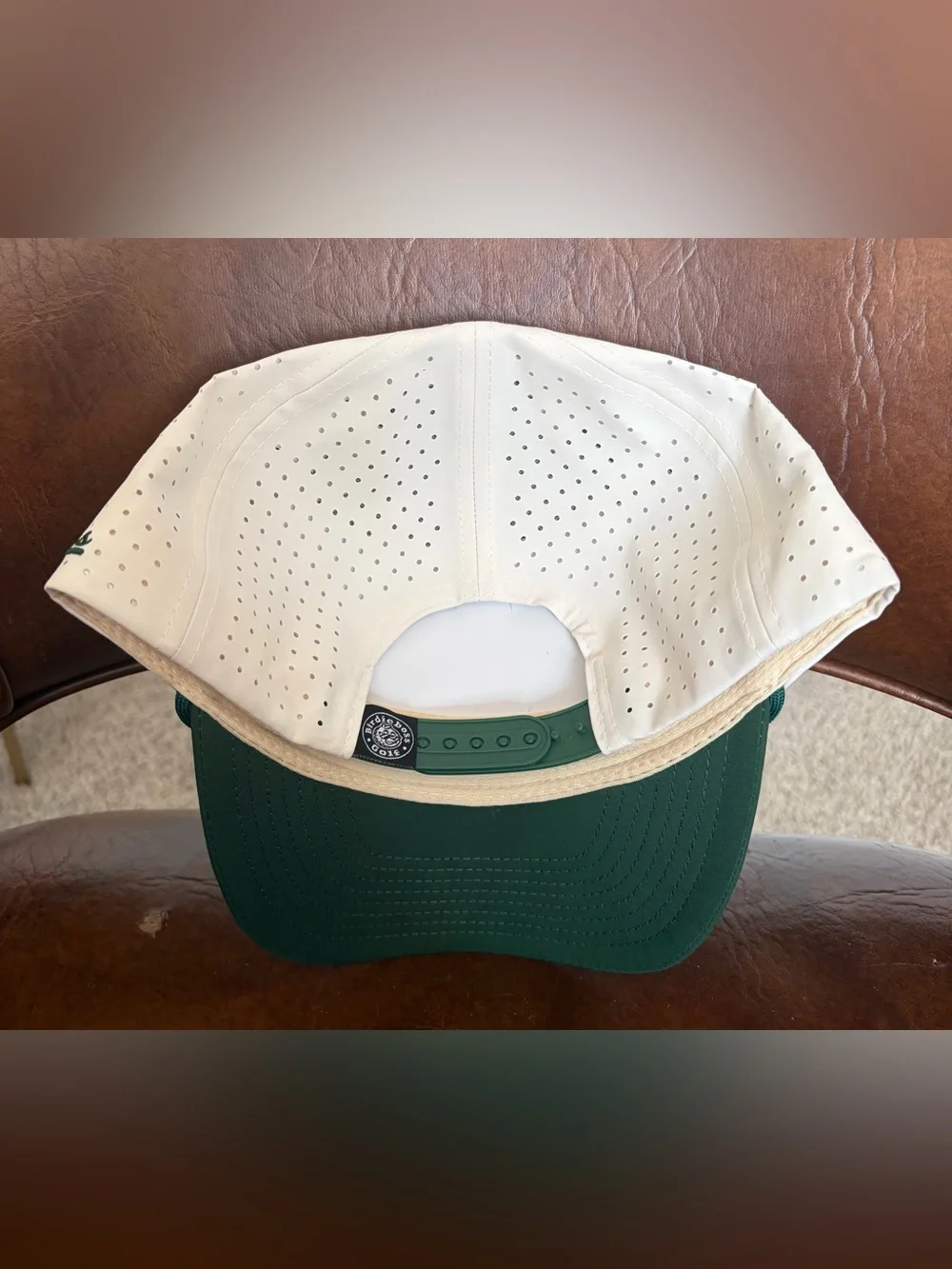 Birdieboss DILF trucker hat features a white crown, a green visor Adjustable